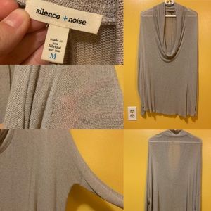 Loose fitting, long, tan, light sweater